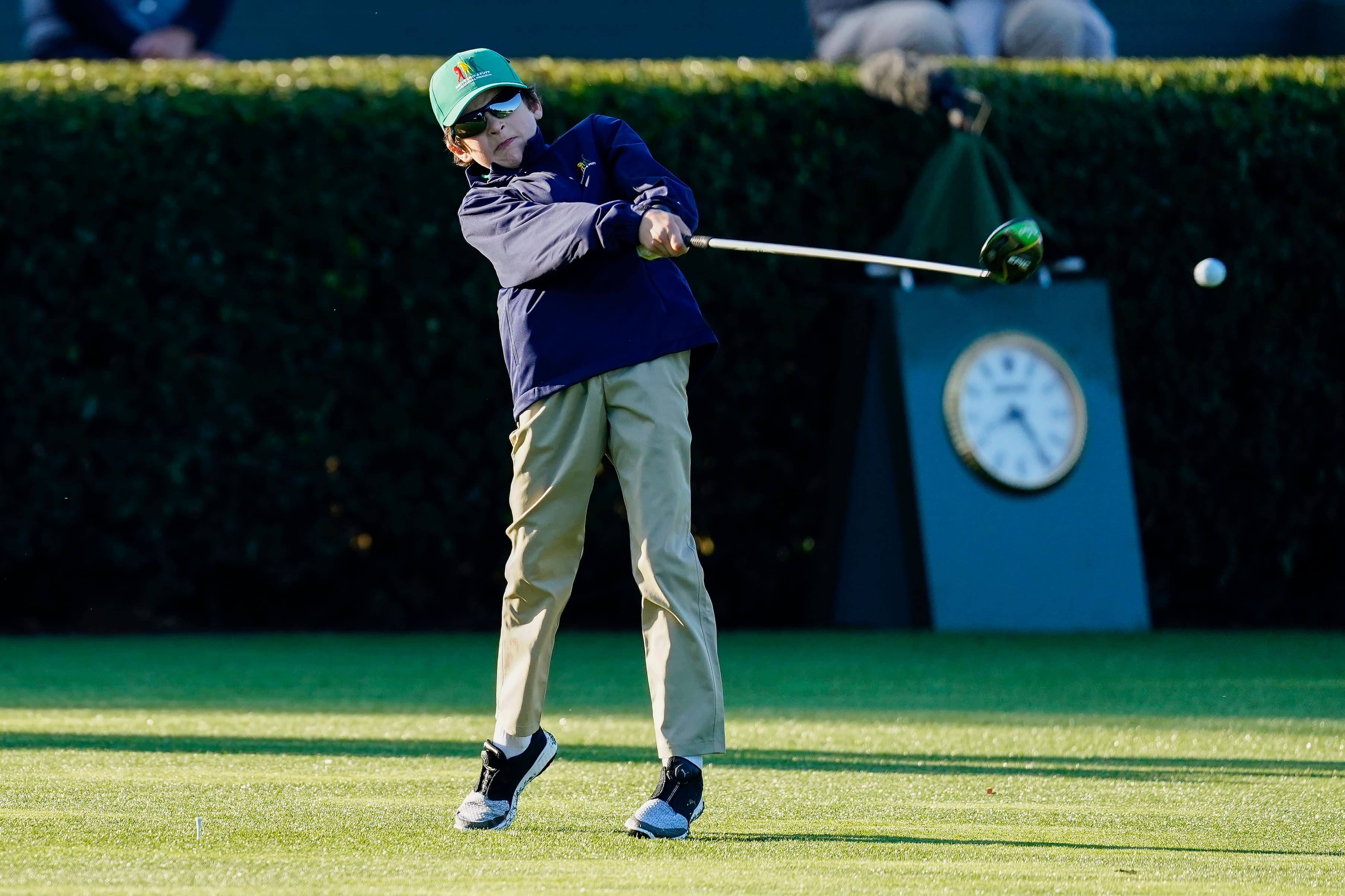 Le Canadien Cole Roberts s’exécute au Augusta National dans le cadre du concours junior Drive, Chip and Putt