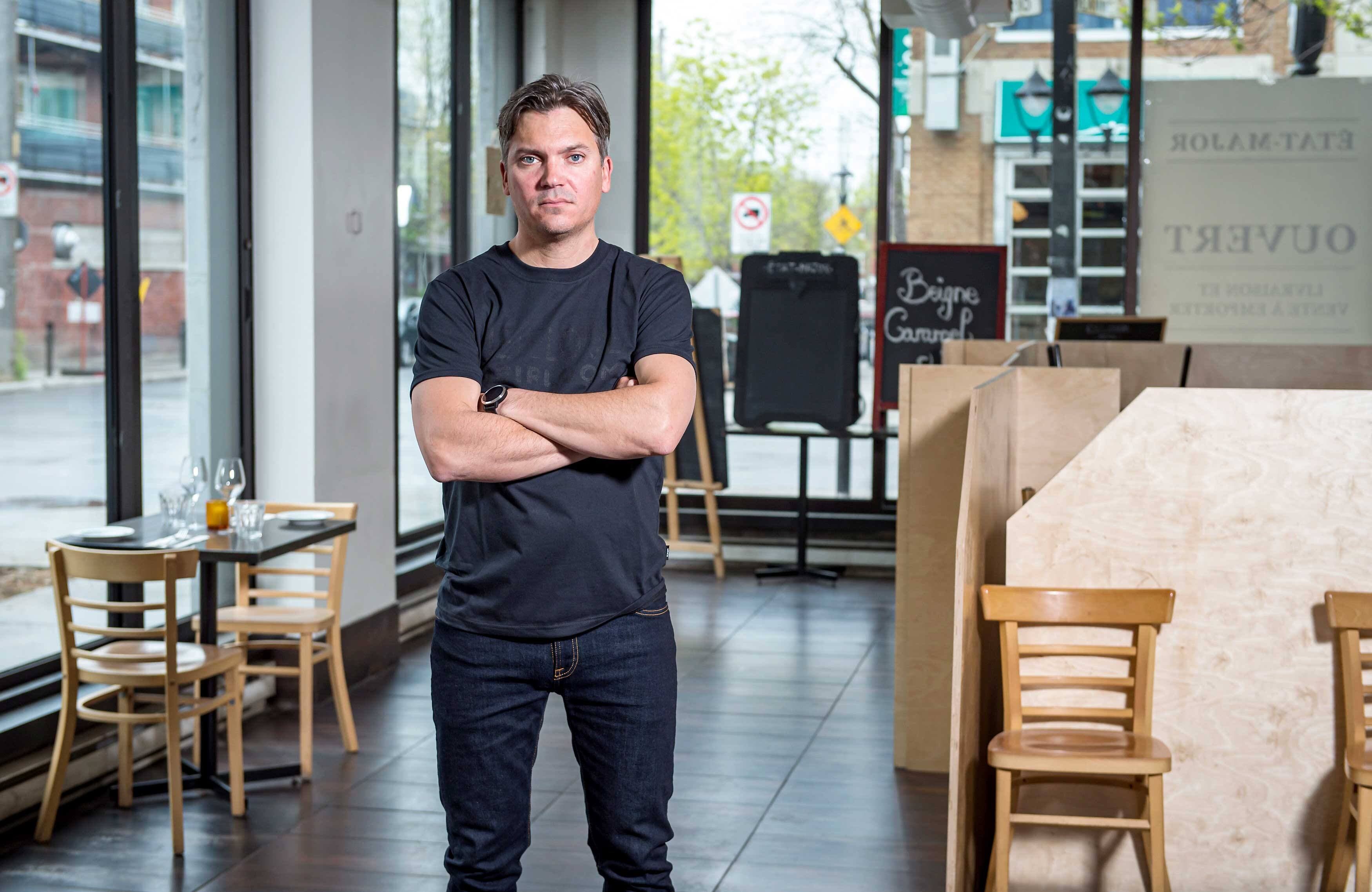 À Montréal, Dominic Laflamme, propriétaire de quatre restaurants dont l’État-Major, se languit d’accueillir des clients dans ses salles à manger fermées depuis sept mois.