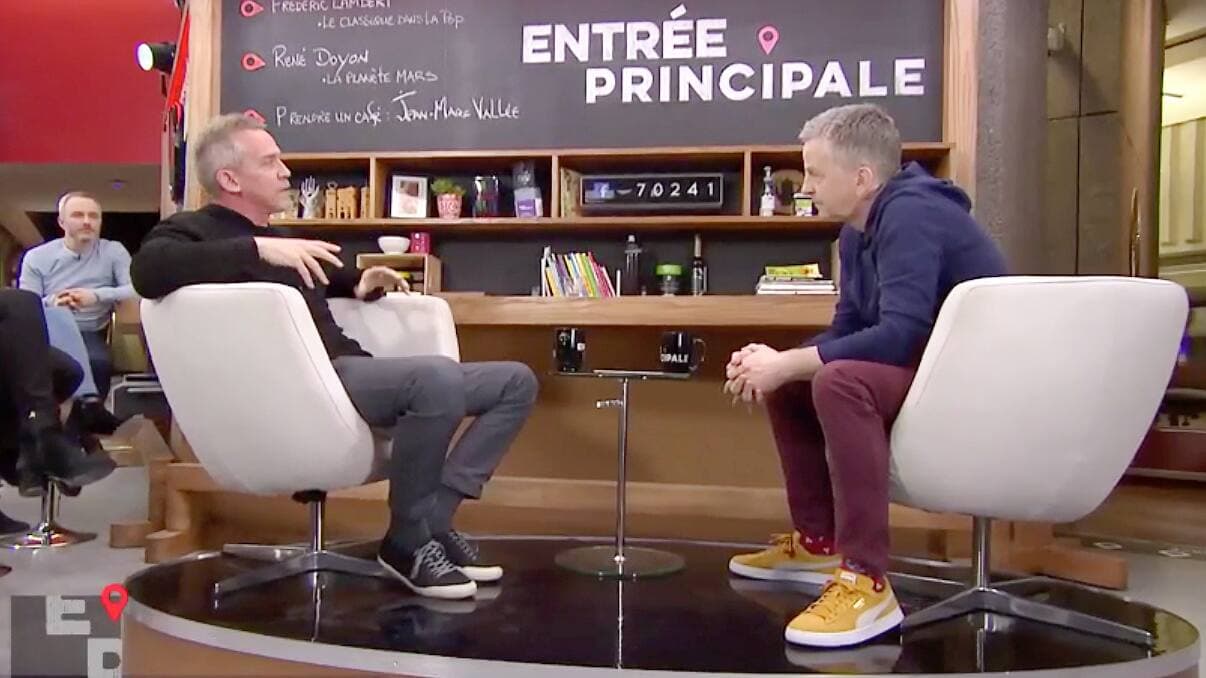 André Robitaille et son ami en entrevue en 2019.