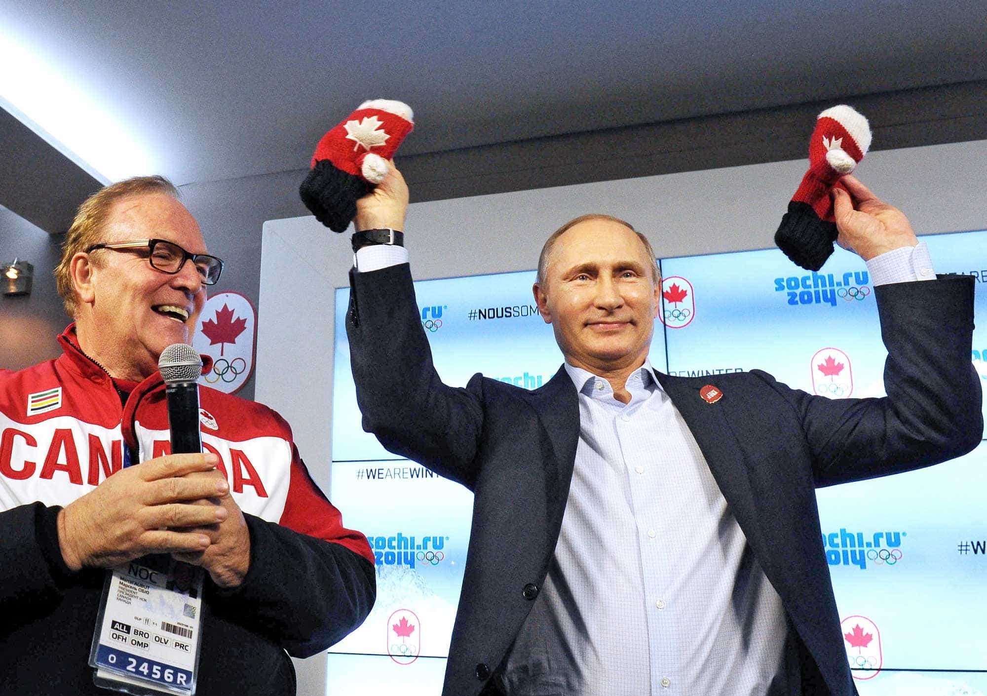 Vladimir Poutine avait profité des Jeux olympiques de Sotchi, en 2014, pour projeter une image positive au monde entier. On le voit ici avec Marcel Aubut, lors d’une visite impromptue à la Maison du Canada.