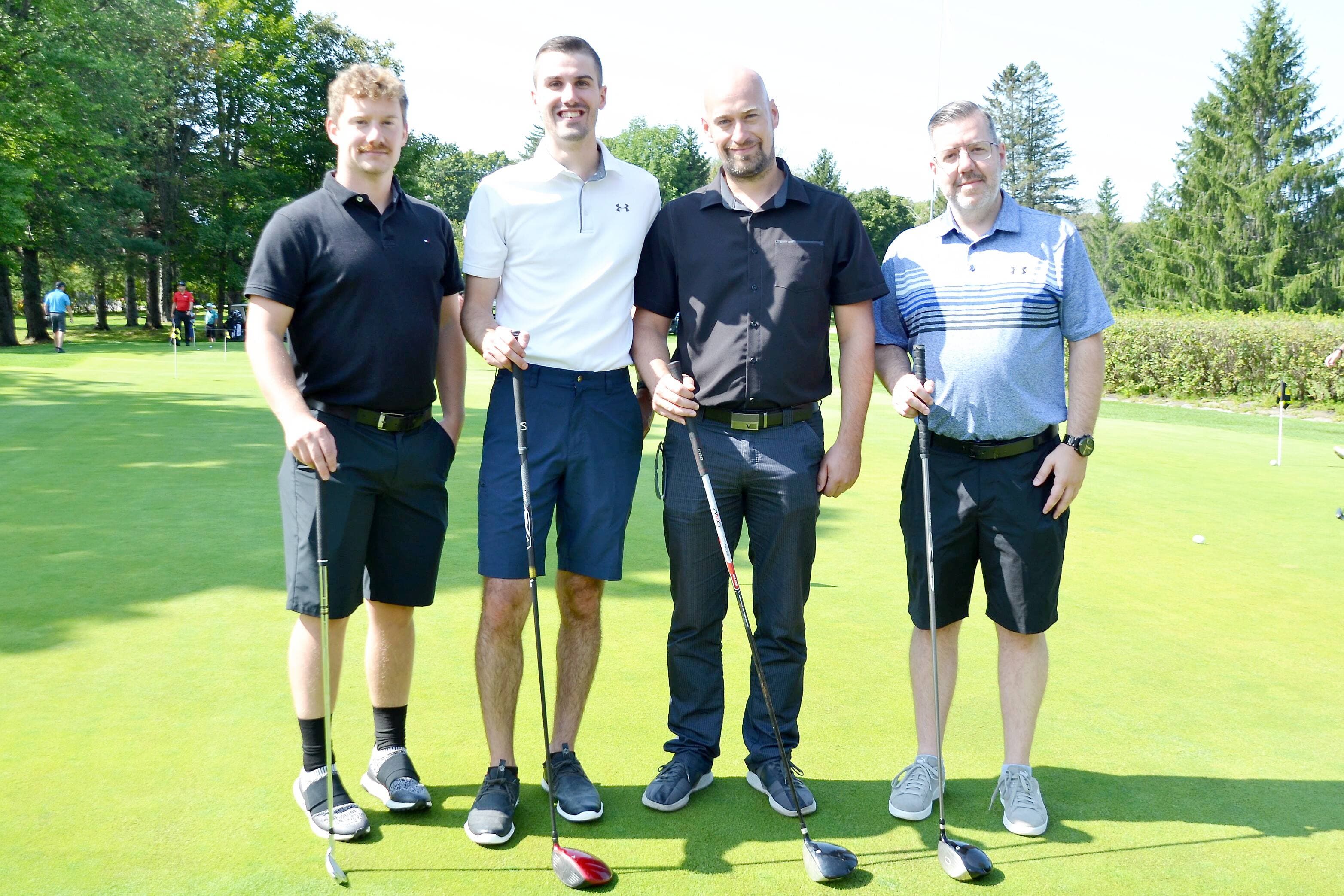 Mathieu Vézina, Vincent Fortin, Jasmin Dionne et Francis Labbé, du Groupe Michel.