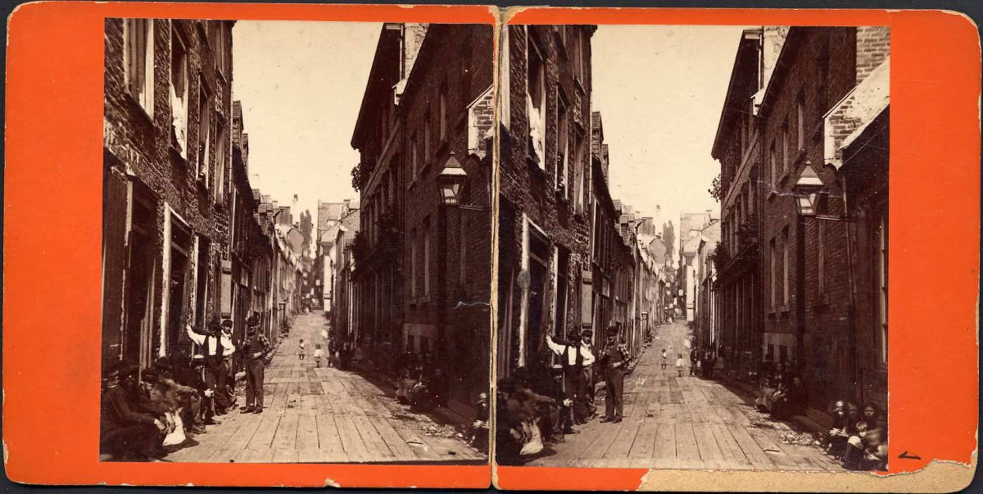 Stéréogramme montrant la rue Petit-Champlain vers 1880, avec en arrière-plan l'escalier Casse-Cou, par Louis-Prudent Vallée.